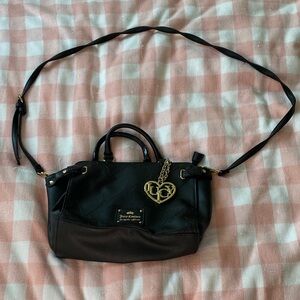Juicy Couture black and gold heart charm pattern faux leather bag